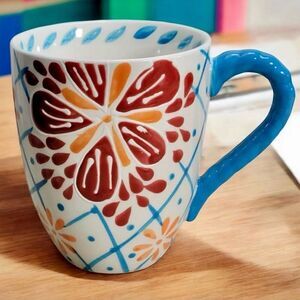 NWT Gorgeous Artistic Accents Relief Floral White, Red, Blue, Orange Ceramic Mug